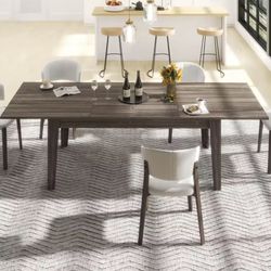 Extendable dining table