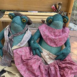Two Stuffed Animal Frogs.