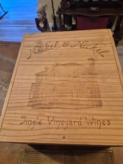 Two solid wood wine crates, one from nickel and nickel napa valley 