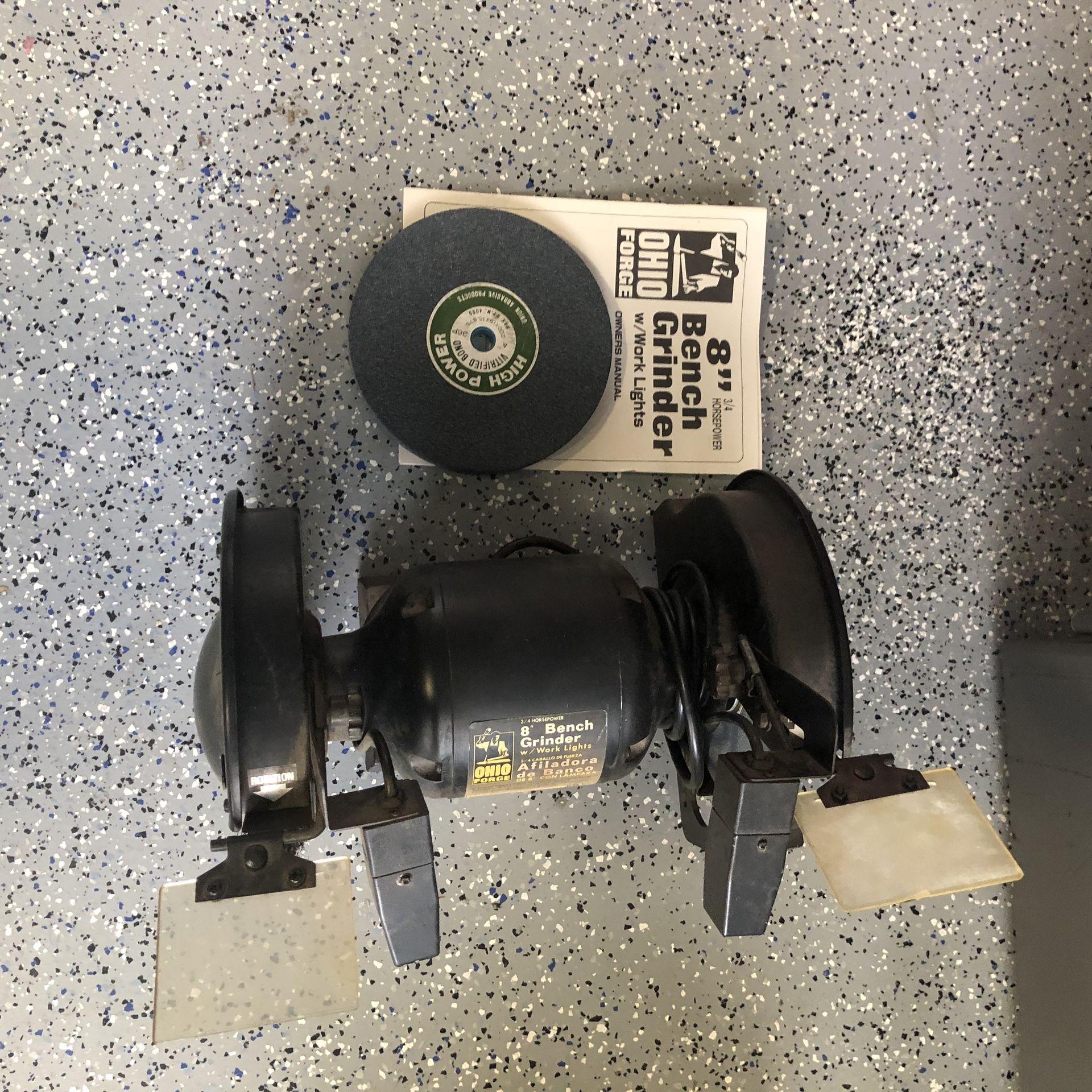Ohio Forge 8 inch Bench grinder with work lights. With an extra grinding wheel.
