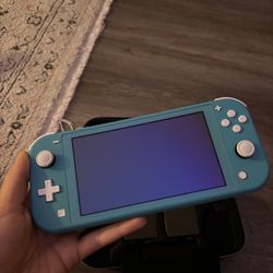 Nintendo Switch Lite WITH GAMES