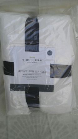 Threshold Microplush Blanket Twin Size Ivory in color