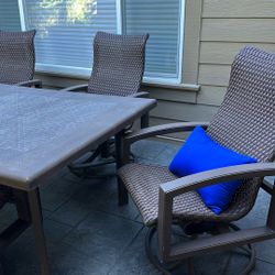 Patio Table And Six Rocker-swivel Chairs