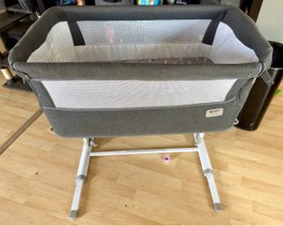 Bedside bassinet- adjustable height
