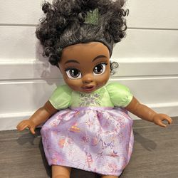 Disney Princess Deluxe 8 inch Tiana Baby Doll Includes Tiara and Bottle, for Children Ages 2+