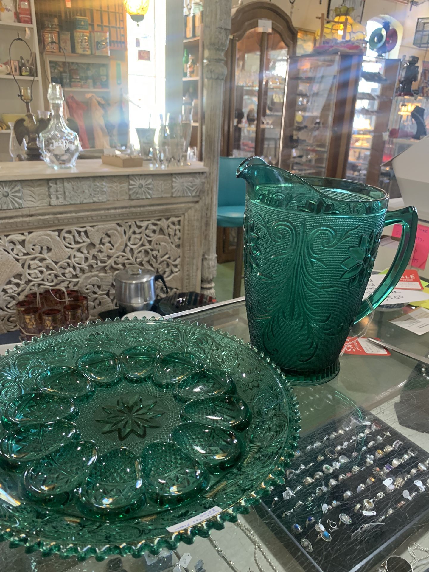 9x10 forest green depression glass pitcher 35.00. 12x12 forest green matching deviled egg platter  25.00.  Johanna at Antiques and More. Located at 31