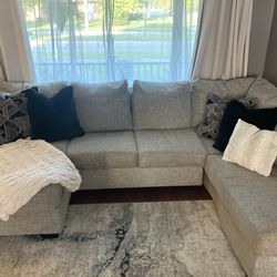 Ashley Furniture Sectional And Ottoman With Storage 