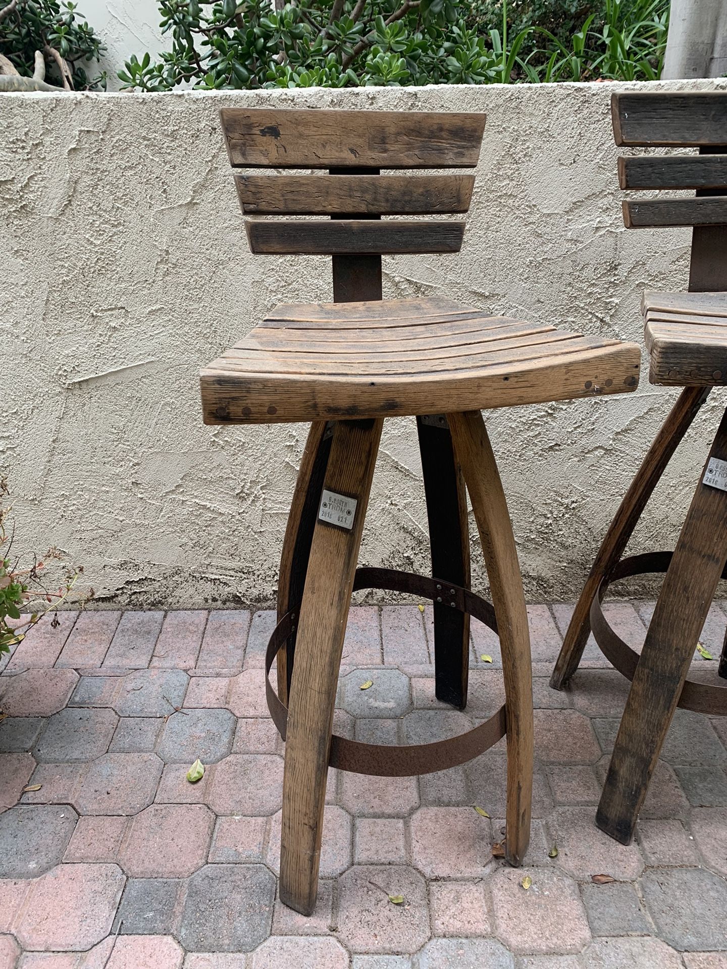 Bar Stools Made From Wine Barrels.