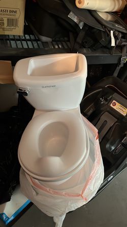 Toddler potty with flushing sound