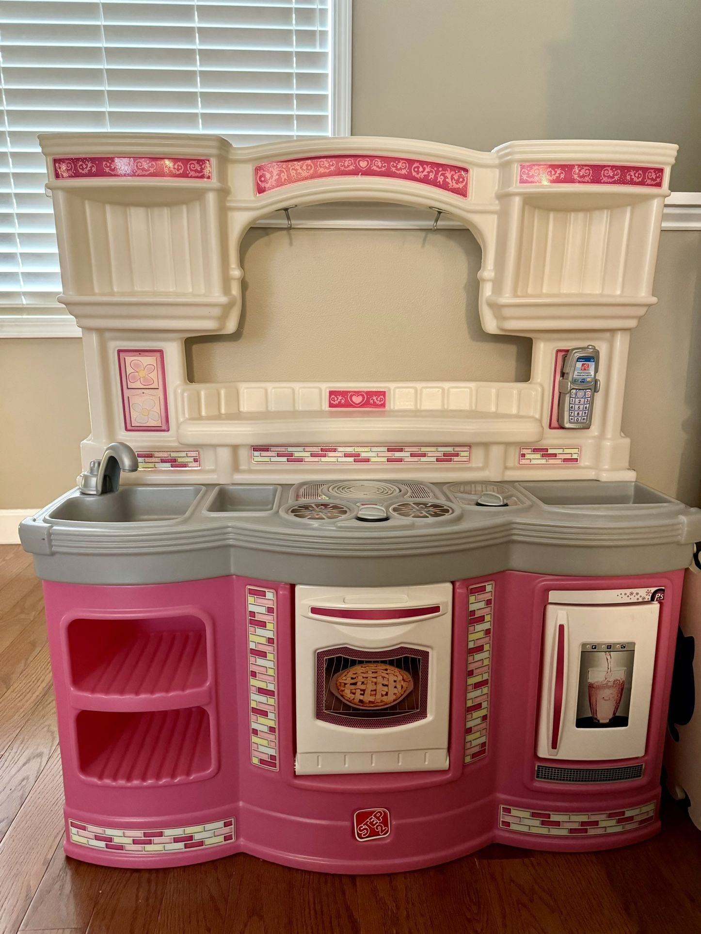 Step2 Play Toy Kitchen In Excellent condition $30 Cash Pickup In Apex Always kept indoors, comes with pretend toy phone that snaps on, storage in the