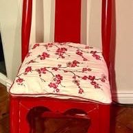 Beautiful handcrafted Chinese horseshoe-back chair in vibrant red lacquer
