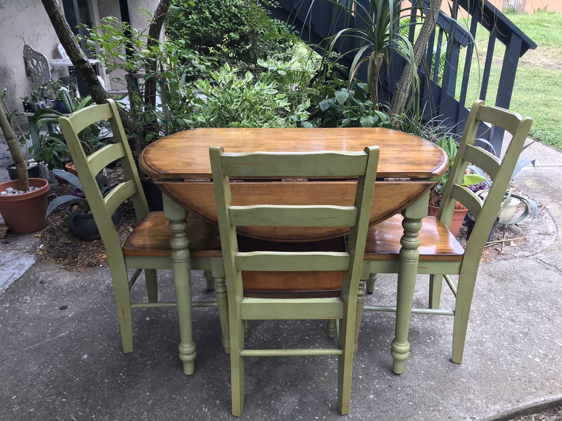 extendable hardwood dining table with chairs