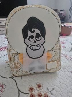Loungefly Disney Villains Pixar Coco Ernesto Backpack