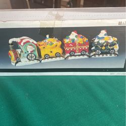 Christmas Train By Lareaux Handpainted fine porcelain four pieces in the original box