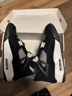 Air Jordan 4 Black and White Sneakers
