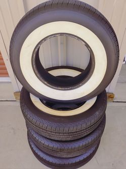 235-75-15  Wide White Wall Tires