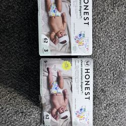 Two Boxes Of Diapers 
