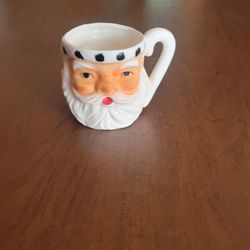 Vintage Christmas Lefton Ceramic Santa & Mrs Clause Double Sided Mug 
Japan #868.
Pre-owned, good shape, there is a tiny chip on top (which is not 
vi