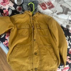 A mustard-yellow utility-style jacket