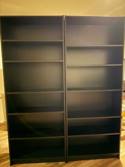 IKEA black and brown bookcases