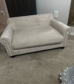 Upholstered dog bed