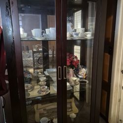 Curio With Table And Four Chairs