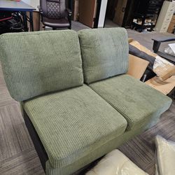 $50/ green loveseat chair. brand new. free one white chair. 