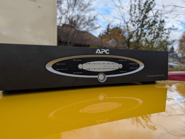 Enhance Your Home Theater Experience with the APC H10BLK Power Conditioner!