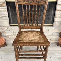 Nice vintage chair. Sturdy. Woven bottom
