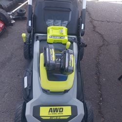 RYOBI LAWN MOWER X2 40V LITHIUM BRUSHLESS WITH 2 BATTERYS AND CHARGER SELF DRIVE 