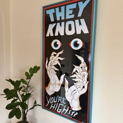 Print in blue metal frame