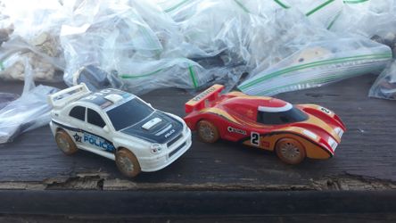 Two electric slot cars
