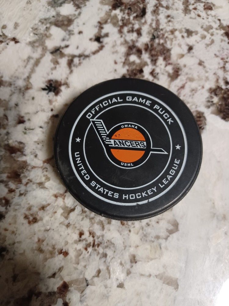 USHL Official Game Puck. Omaha Lancers. Used