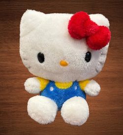 HELLO KITTY PLUSH DOLL BY https://offerup.com/redirect/?o=U0FOUklPLkJMVUU= OVERALLS /RED BOW 10”