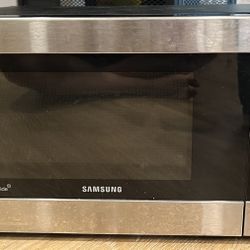 1.1 cu. ft Countertop Microwave with Grilling Element in Stainless Steel