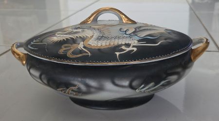 Vintage Japanese Moriage Dragon Tureen, black raised relief dragon design with gold gilded handles and lid knob.
Oval shape: 8.74 in long, 7 in wide, 