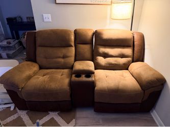 Double reclining rocker love seat