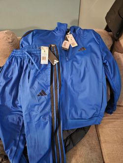 Adidas track suit Brand New