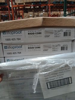 Waterproof vinyl tile flooring