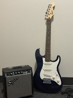 Fender Squier Stratocaster electric guitar with amp