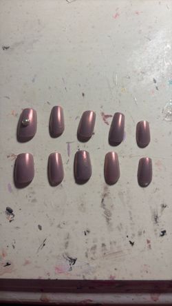 Fake nails sizes are pretty small so you can size them if you need to a light brown probably made for winter vibes