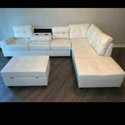New White Reversible Leather Sectional And Ottoman