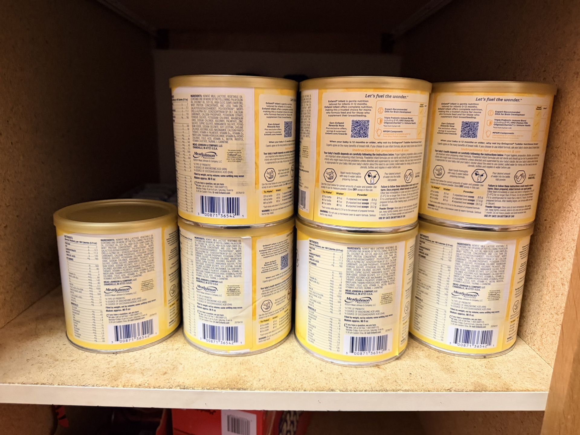 Yellow Enfamil Cans