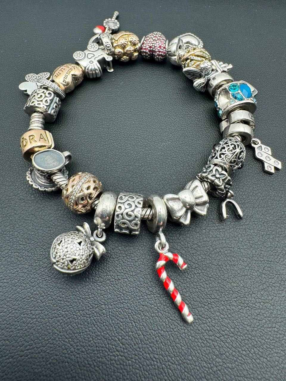 Pandora 925 sterling silver gold 7.5โ charm bracelet with 22 charms