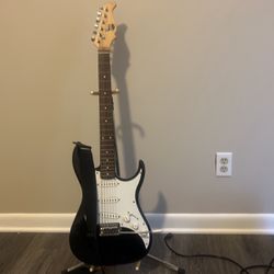 Electric Guitar With Amp And Cable 