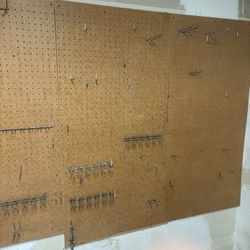 Approx 6’ X 4’ Wall Space Of Peg Board With misc Peg Hooks