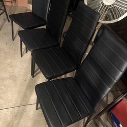 Faux leather black chairs