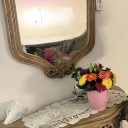unique hand carved console with mirror.