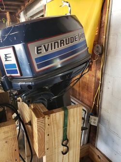 1982 140 hp Evinrude with control and it has power trim and tilt