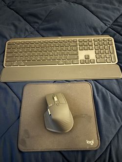 Logitech Keybourd, Mouse, and Mousepad.